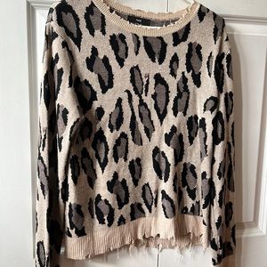 Distressed leopard print sweater